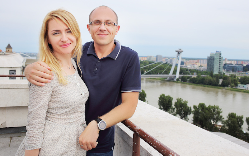 Man and woman posing for memory photograph in Old Town of Bratislava